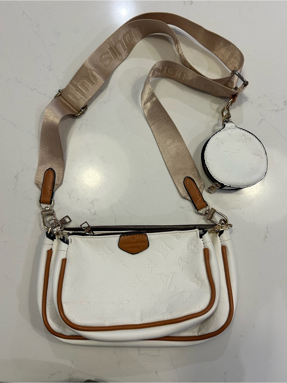 Imitation Luxury White Leather Crossbody Trio Bag with Tan Trim.